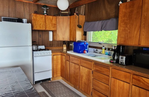 Big Lake Cabin | Dry cabin on Big Lake with Lake access, shared dock with private deck.