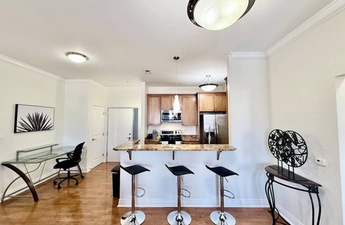 Cole-Noble District Apartment | Elaborate Downtown Suite for 6 with fireplace/view