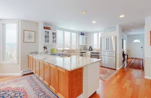 Waterbury Center House | Elegant & renewed mountain-view home with private hot tub, large deck & backyard