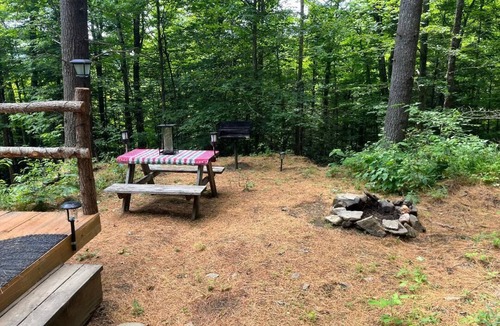 St. Johnsbury RV Rental | Enchanting Off=Grid Glamping Tent @ Dagger's Ravine