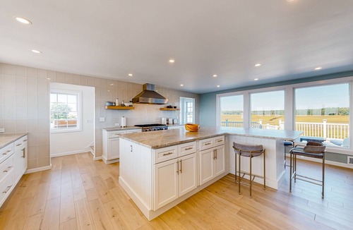 Rye House | Exquisite oceanfront home with fireplace, balcony, AC & W/D