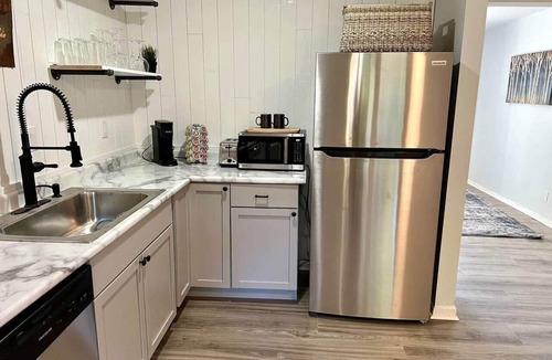 Royal Manor House | Family & Fur Friendly: 4-BR, Arcade, Fire Pit, Fenced, King Bed, & Smart TV!