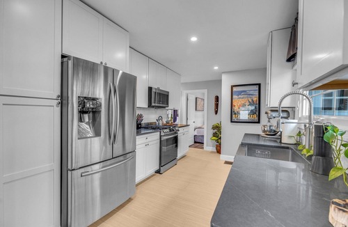 Devon House | Fully Updated Home Near Wildemere Beach, Walk to Water, Pet Friendly Fenced Yard
