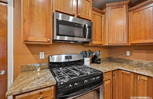 Eagle River House | Gorgeous Mountain Views, peaceful retreat with Hot Tub, Fenced Yard & Huge Deck!