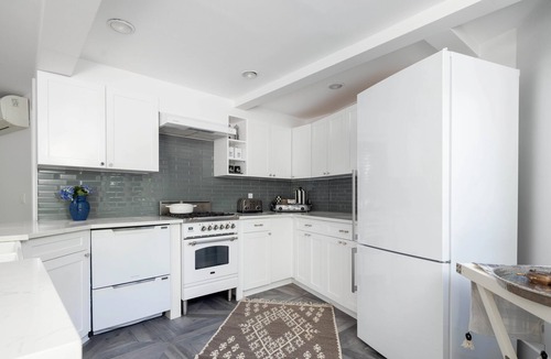 Hampton Bays House | Hexagon shape cottage with pool & koi fish pond