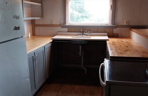 Drexel House | Historic 150 year old renovated schoolhouse 1-bedroom in Drexel with AC