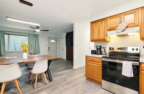 Tudor Area House | Hugs In The Dusk - 2 Beds 1 Bath unit—one side of a duplex in Midtown Anchorage.