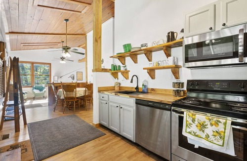 Jefferson Township Cabin | Indoor treehouse! Swivel fire pit & gas grill. Close to trails & attractions.