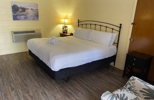 Mount Ida Hotel | JI6, King Guest Room at the Joplin Inn at entrance to the resort by RedAwning