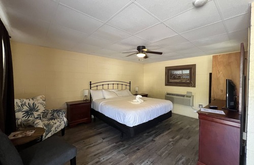 Mount Ida Hotel | JI6, King Guest Room at the Joplin Inn at entrance to the resort by RedAwning