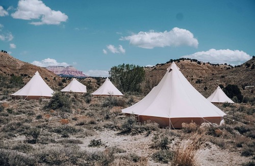 Tropic House | King Tent w/Shared Bathroom - Beauty awaits you just past the red cliffs.