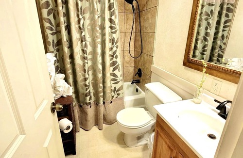 Mount Ida Hotel | Lake View Queen Guest Room With Two Queens, Sleeper Sofa And Patio Overlooking Lake Ouachita. 1 Bedroom Hotel Room by RedAwning