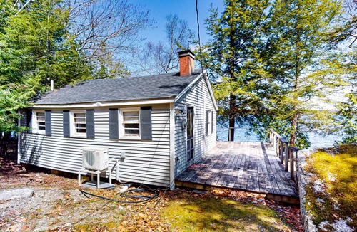 Otis Apartment | Lakefront cabin with deck, grill, screened porch, & firepit - dog-friendly