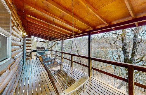 Eureka Springs Cabin | Lakefront dog-friendly log cabin with private boat access, firepit, & grill