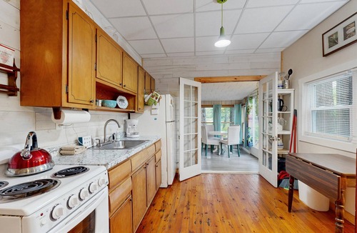 Augusta Cottage | Lakefront Home on Togus Pond with 2 Decks, Great View & Canoe/Fire Pit