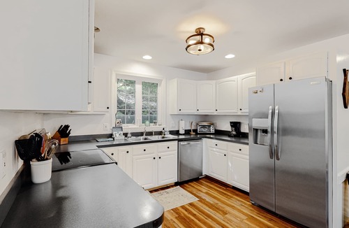 Windham House | Lakefront home with sunrise views, private dock, kayaks, paddle boards, WFH desk
