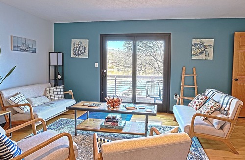 Warsaw House | Lakefront Retreat + private dock + game room + large patio pizza oven bar