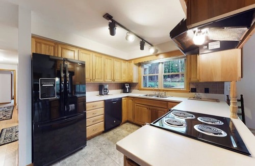 Norway House | Lakehouse home with private dock, firepit, grill, kayaks and canoes