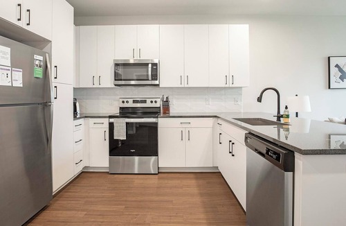 North Kansas City Apartment | Landing | Chic 1BD, Yoga Studio, Courtyard