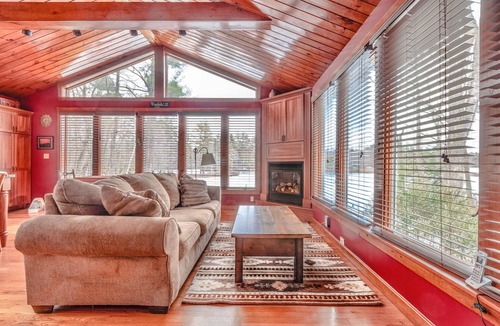 Barrington House | Light, airy, comfy, casual, wooded, lakefront home with private sandy beach