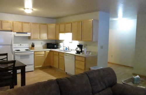 Moose Creek Apartment | Log 3-Bdr in Moose Creek among the birch and spruce trees