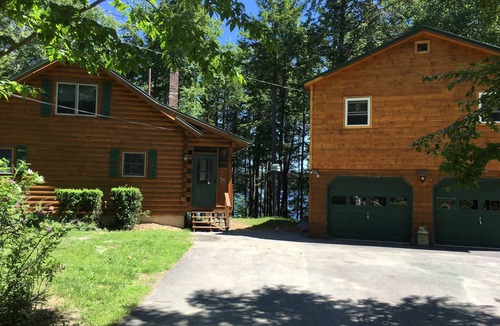 Lowell House | Log home on untouched cold stream lake