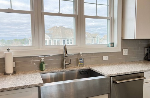 Ocean City House | Luxurious coastal getaway with multiple balconies, patio, & stunning ocean views