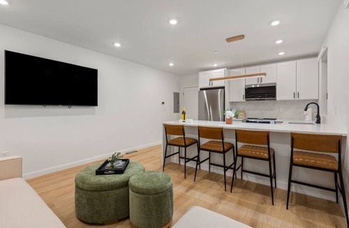 Jeffries Point Apartment | Modern Coastal City Stay | Waterfront & Airport