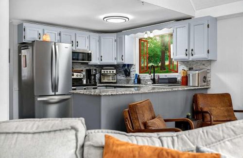 The Woods House | Modern Mountain Chalet with Stone Fireplace & Resort Amenities near Hedgesville, WV