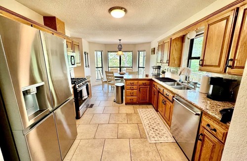 Lost Bridge Village House | Nature Lover’s Dream with Expansive Tiered Deck Spaces in Garfield, Arkansas