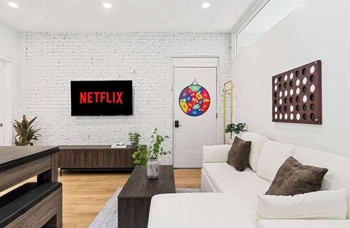 Griggs Park Apartment | Near T & Fenway Park Private Deck Rooftop BU BC