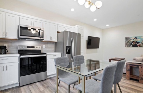 Evansville Hotel | New Boutique Hotel Suite on Haynie's Corner: KING Bed, Parking, Security & More!