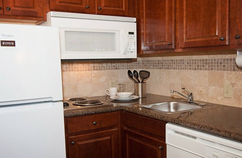 Greenwich Apartment | Outdoor Pool. Free Breakfast. Near Koch Industries & Boeing Offices