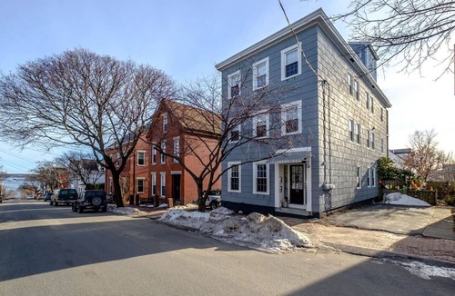 Munjoy Hill Apartment | Panoramic Water, Island & City Views w/Private Roof Deck