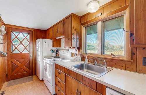 Owls Head Cabin | Peaceful coastal cabin with screened porch, water view of the cove, dog-friendly