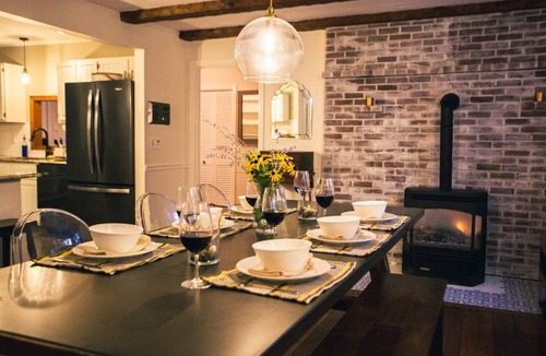 Webster House | Peaceful Family Friendly Riverside Retreat w/Gym, Hot Tub, Dock and Sunroom