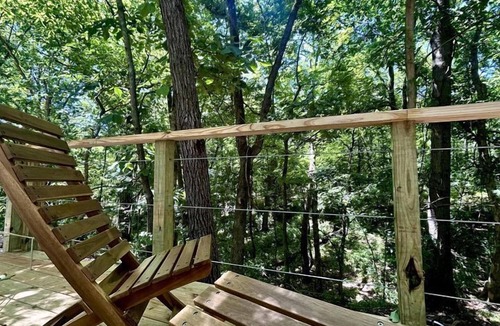 Gentry RV Rental | Peaceful Glamping Tents with Elevated Decks, Cozy Fire Pit, and Secluded Forest Views Near Gentry, AR