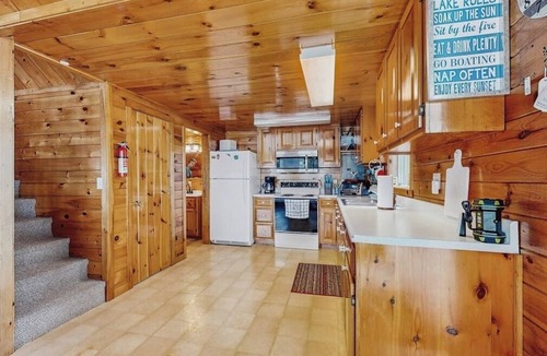 Otis House | Peaceful Lakefront Escape with Outdoor Dining, Beach Access, Deck & Firepit