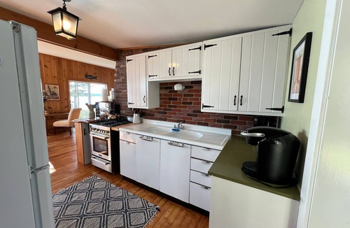 Winter Harbor Cottage | Quaint and rustic cottage nestled on the shores of a small Maine village.