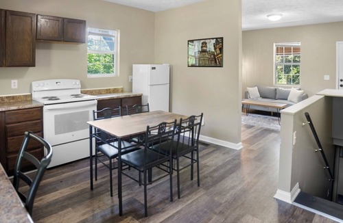 Mansfield House | Quiet home close to Reformatory and downtown. Firepit, deck, & disc golf basket