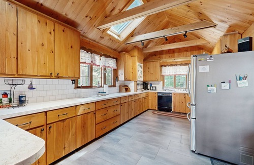 Meredith House | Quintessential lakefront home with woodstove, beach access, dock & washer/dryer