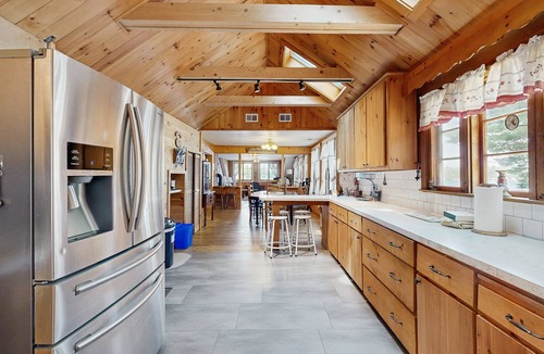 Meredith House | Quintessential lakefront home with woodstove, beach access, dock & washer/dryer