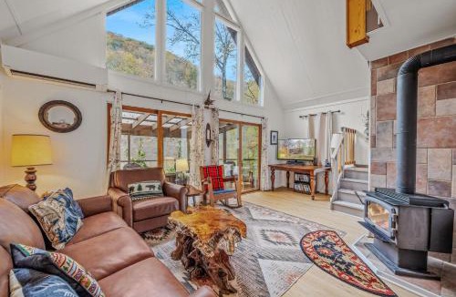 Great Cacapon Ski Chalet | River Time Cabin - Riverfront, Hot Tub, Screen Porch, Fishing, Games, View, 3 King Beds