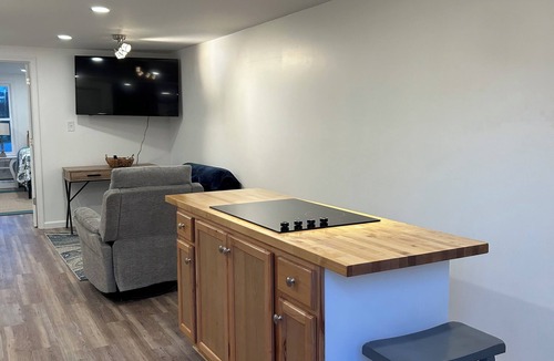 Bairdford Apartment | Riverside Retreat, a charming studio near Oakmont and Pittsburgh with WiFi, AC