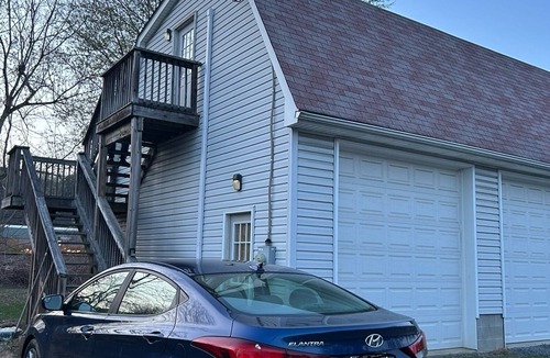 Bairdford Apartment | Riverside Retreat, a charming studio near Oakmont and Pittsburgh with WiFi, AC