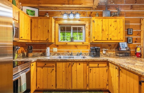 Logan Cabin | Rustic Cabin Getaway with Hot Tub, Trails & Fire Pit
