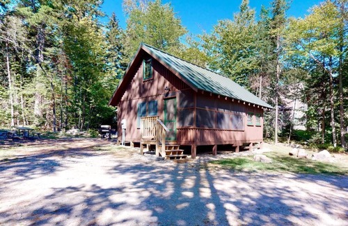 Greenville Junction Cabin | Rustic cottage with an outdoor firepit - close to the lake!
