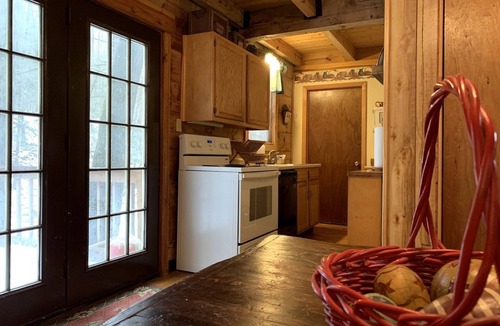 Mingo House | Rustic Wooden Cabin Settled Between Trees in Monterville, West Virginia