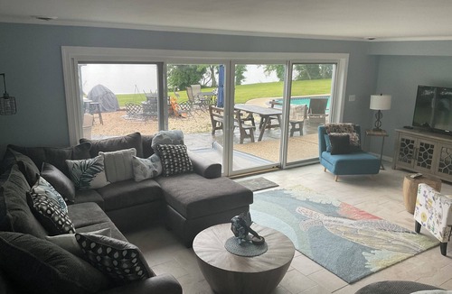 White Marsh Villa | Secluded Waterfront Retreat 2 bed 1 1/2 baths private guest house w Pool & Beach