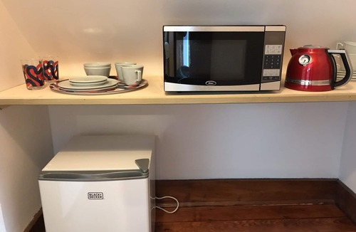 Egleston Square House | Skylit Suite in Musical home